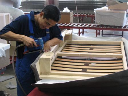 Using pneumatic staplers on sofa